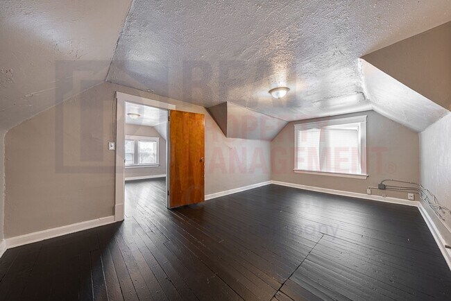 Building Photo - 11702-11704 Saywell Ave,