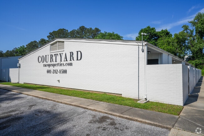 Building Photo - Courtyard Apartment Homes