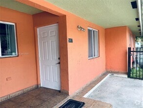 Building Photo - 5857 NW 13th Ave