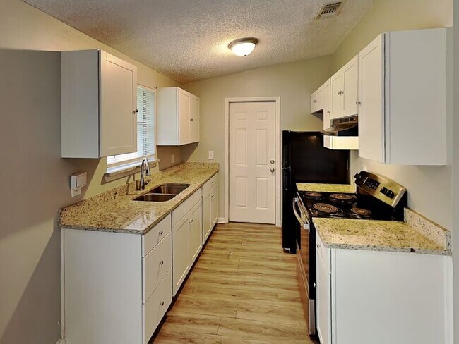 Foto del edificio - 7147 Melvin Rd