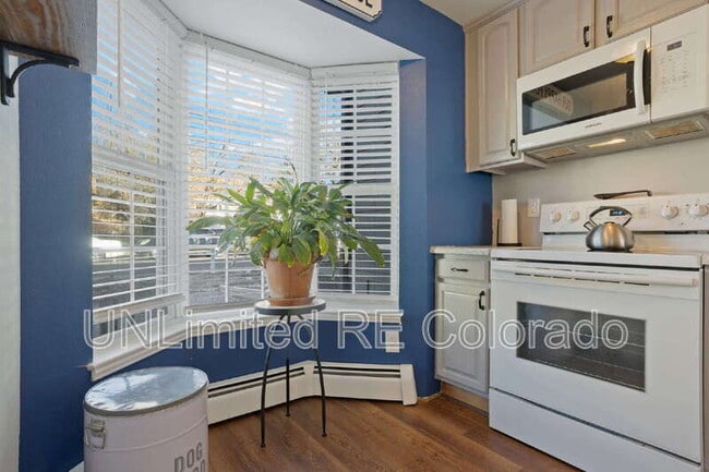 Building Photo - 9044 W 63rd Ave