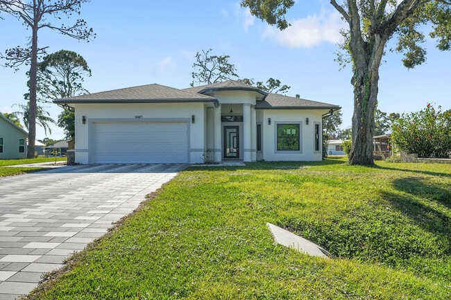 Building Photo - 6607 Deland Ave