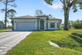 Building Photo - 6607 Deland Ave