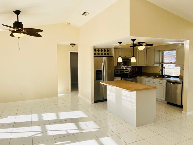 Building Photo - Available Now Welcome to this Annual 3 bed...