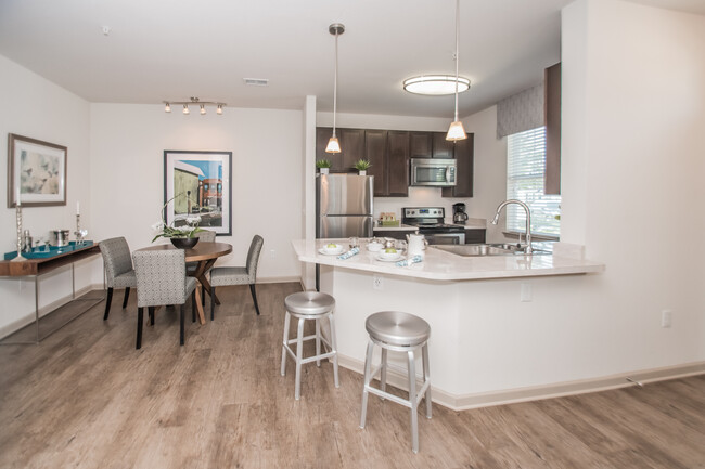 Open Kitchen w/ Dining Area - Otarre Pointe