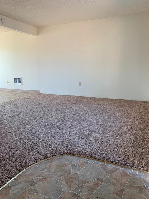 Building Photo - Middle unit in 8-plex complex