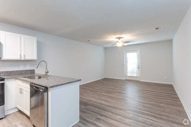 Cocina con vista a la sala de estar - Timber Woods