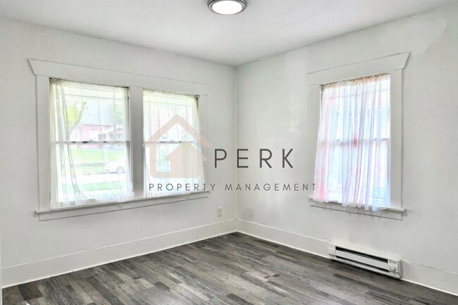 Building Photo - Charming Updated South Tacoma Home with Spacious Bonus Loft and Fenced Yard