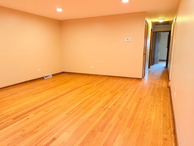 Newly varnished hardwood floors - 12416 S 44th Ct
