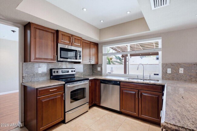 Building Photo - 6259 E Acoma Dr