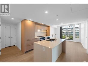 Building Photo - 5212-5212 Cambie Rd