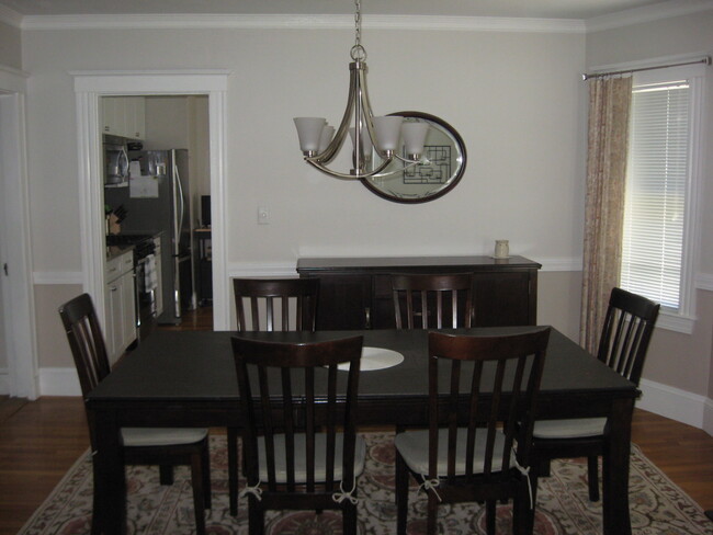 Dinning room from the living room. Kitchen in the background. - 149 Willow Street