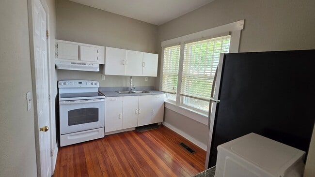 Building Photo - Garrett &amp; Associates, LLC - Tri Plex