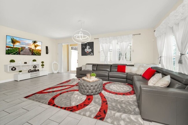Building Photo - Unwind in Style: Heated Pool, Game Room, a...
