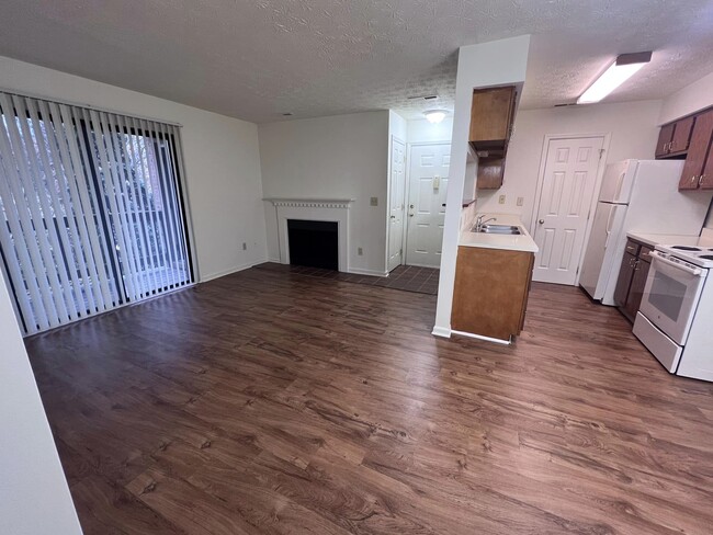 Living room with plank - Allison Heights Apartment Community