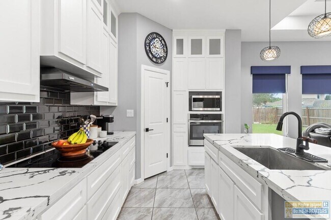 Foto del edificio - 9388 N Queen Palm