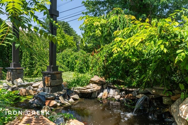 Building Photo - Beautifully Updated Three-Bedroom with Koi...