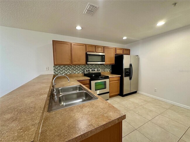 Foto del edificio - 13511 Tea Rose Way