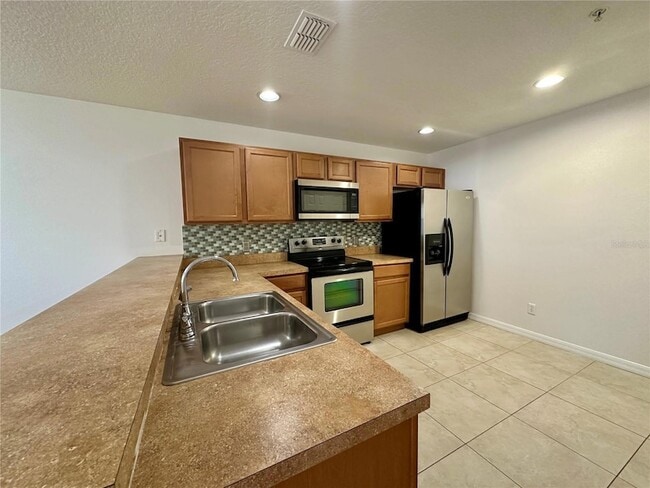 Building Photo - 13511 Tea Rose Way