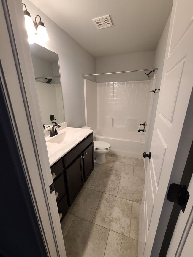 Photo - Open floor plan, Fridge included, fully fenced yard, neighborhood playground. House