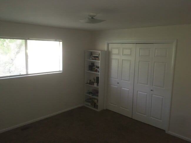 second floor spacious second bedroom with large window - 2477 E 2100 S