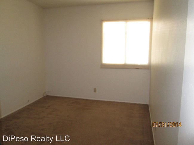 Building Photo - 202 N Cochise Ave