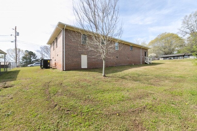 Building Photo - Move-In Ready 4-Bedroom Gem – Comfort & Convenience Combined