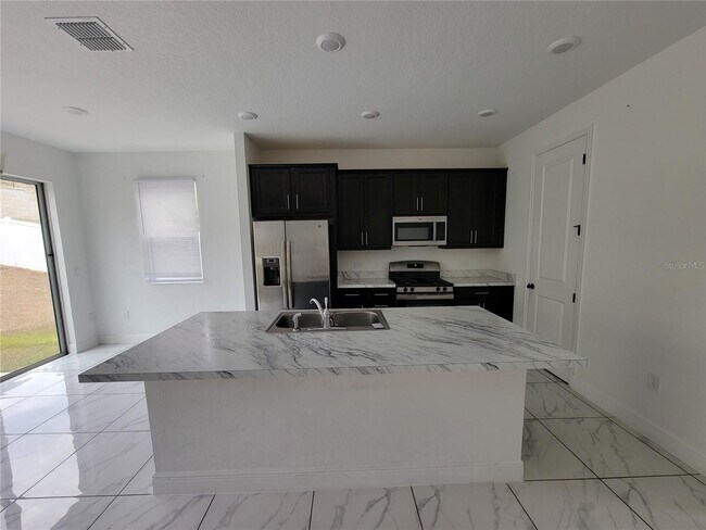 Foto del edificio - 2499 Spring Breeze Dr