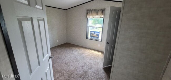Building Photo - 3 br, 2 bath Mobile Home - 610 Akita Ln