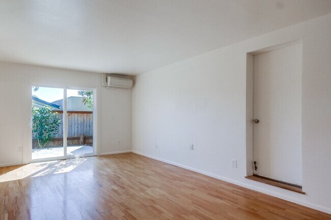 Building Photo - Charming 2BR Home with Attached Garage, Private Patio and a Friendly Community!