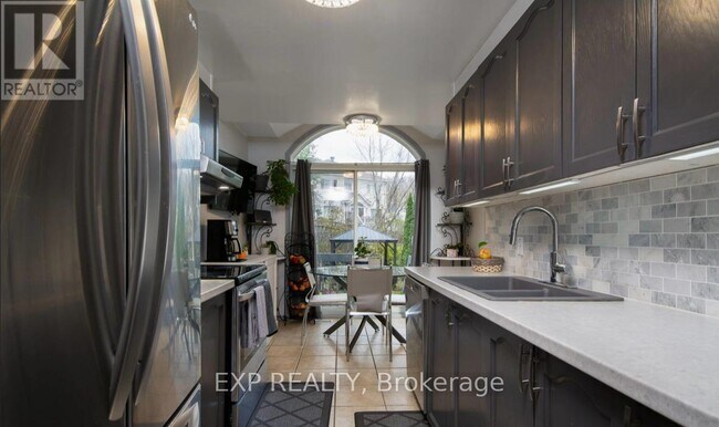 Building Photo - 61 Flowertree Crescent