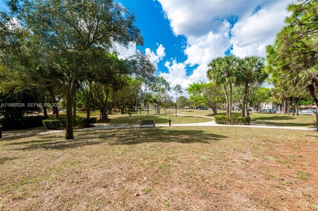Building Photo - 6301 N Falls Cir Dr