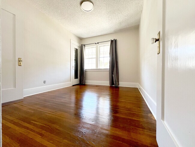 Completely refurbished hardwood floors. - 1817 E 8th St
