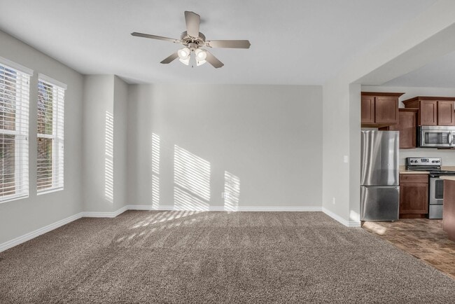 Building Photo - Spacious 4BR End-Unit Townhome | Low-Maintenance HOA Living