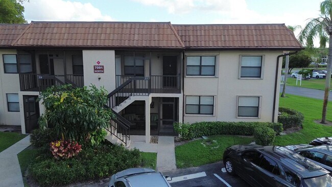 Building Photo - 7091 Golf Colony Ct