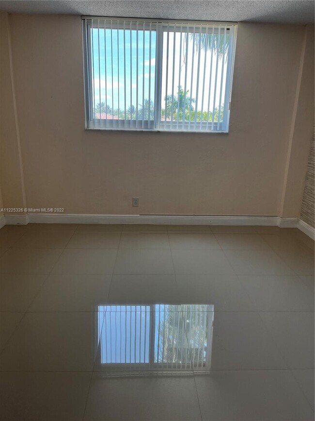 Building Photo - 19380 Collins Ave