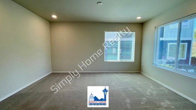 Building Photo - Step Inside to a Townhome Made for Easy Living!