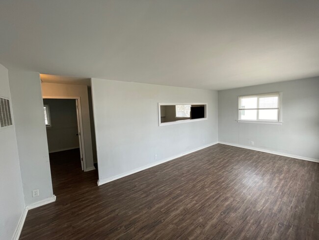 Living room with pass-through to kitchen - 480 Carol Dr