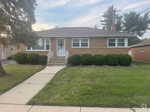 Building Photo - 1006 E 163rd Pl
