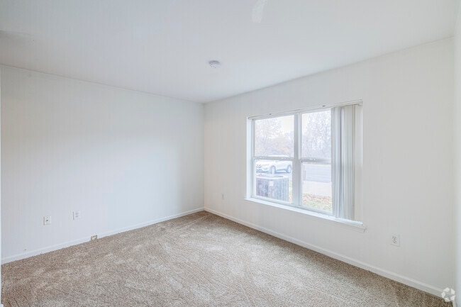 2BR, 2BA - 959SF - Primary Bedroom - Frontier Ridge Apartments