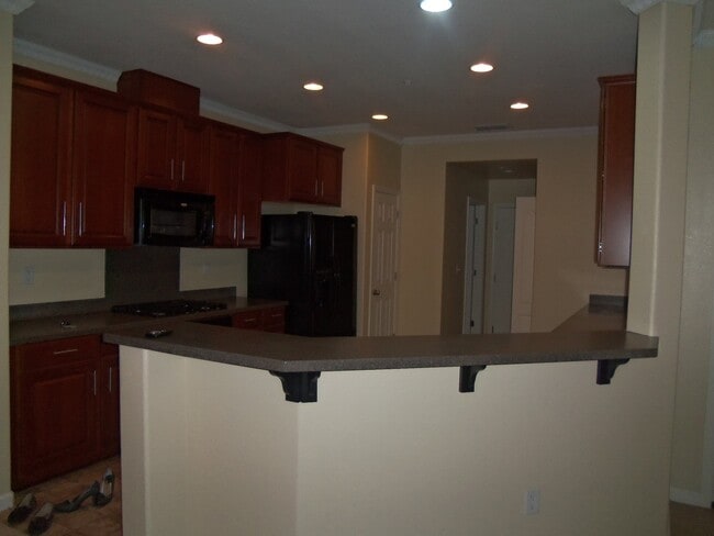Building Photo - This is a condo nicer than most single family homes!!  (Please read entire ad for showings).