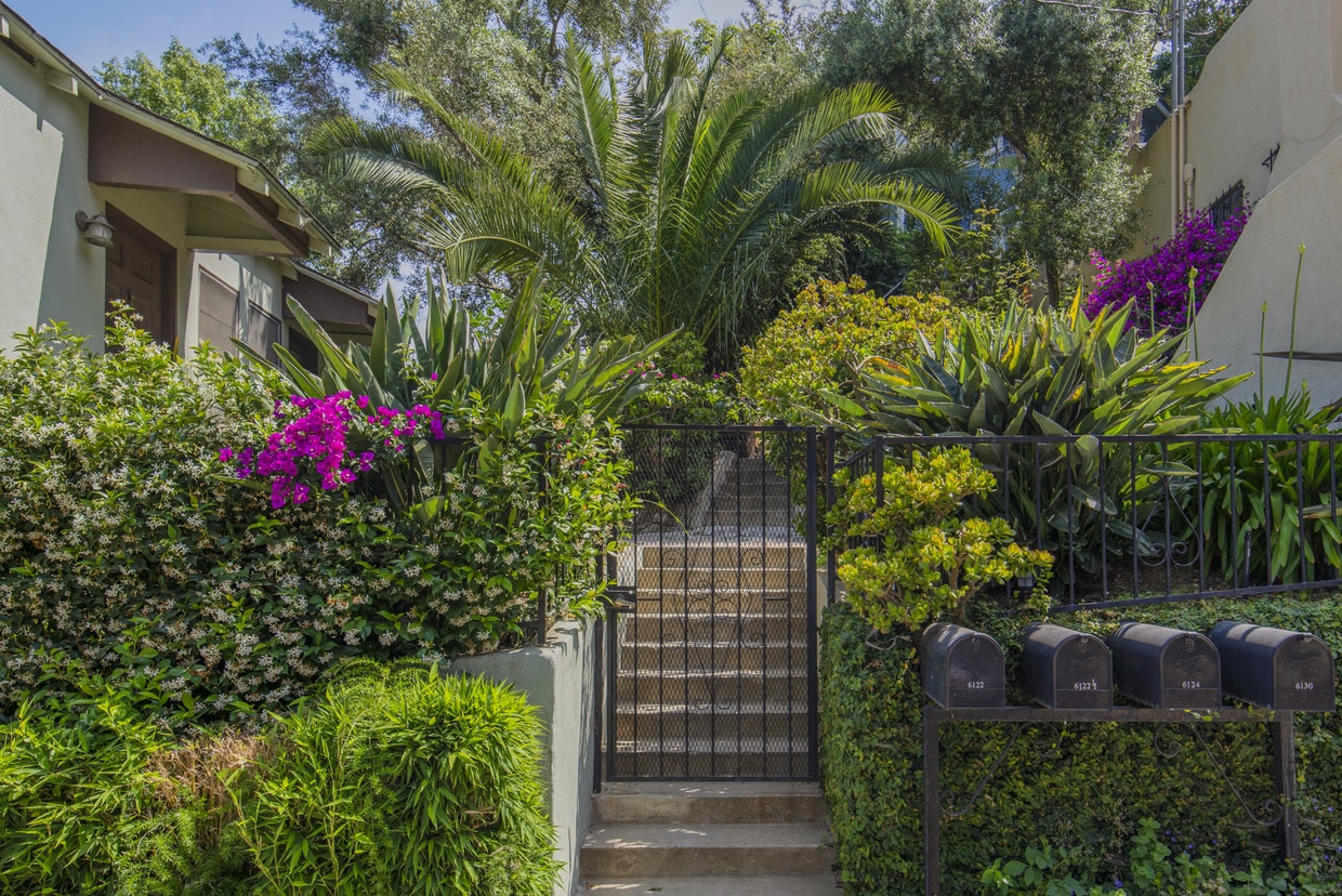 Entry gate to lush garden - 6122 Glen Tower St