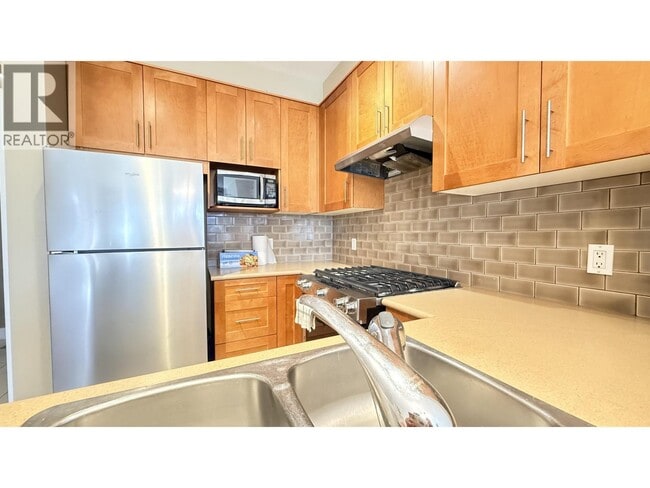 Building Photo - 2083 W 33rd Ave