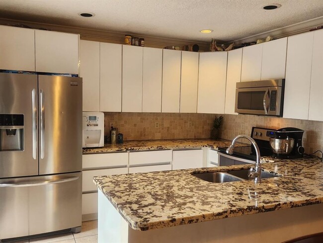 Building Photo - 8574 Boca Rio Dr
