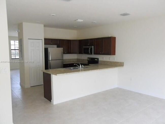 Building Photo - 9355 W 33rd Way