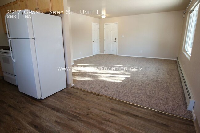 Building Photo - Remodeled top floor apartment! Close to base!
