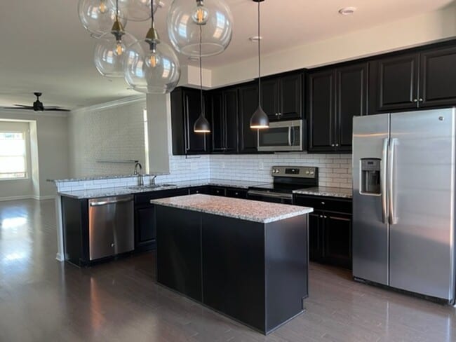 Building Photo - Recently Constructed End of Unit 3 Bedroom...