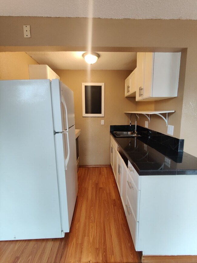 Building Photo - 1401 W. 1st Av.