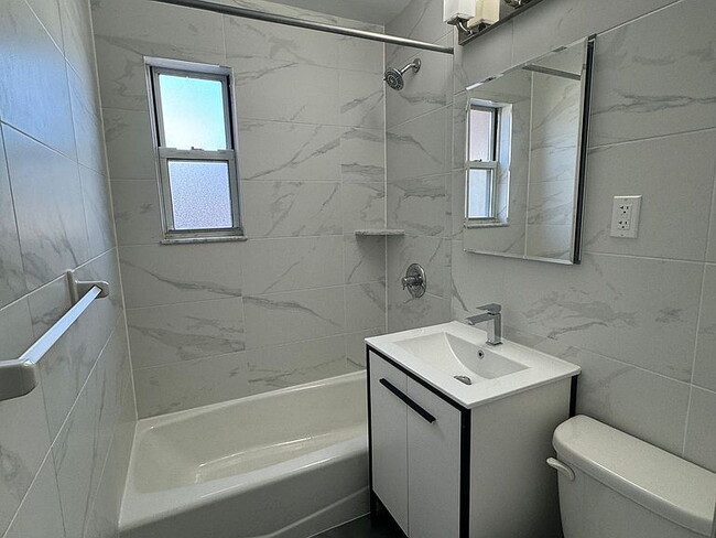 Photo - "Charming 3-Bed Oasis in Oakland Gardens with Modern Granite Touches!" Apartment