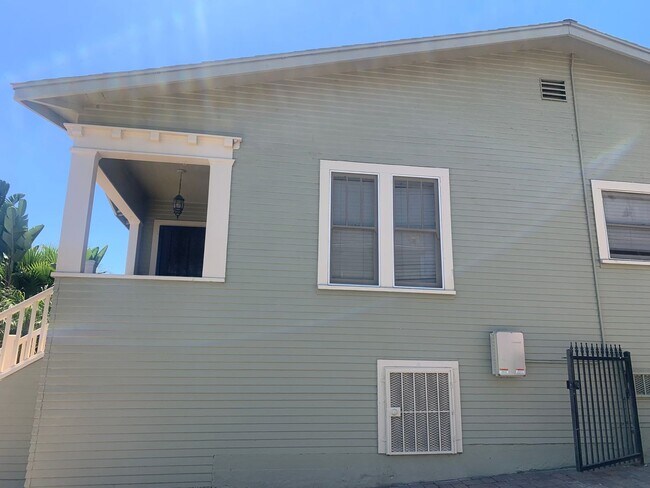 Building Photo - Fully gated Charming craftsman Two bedroom...